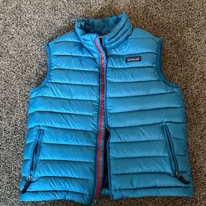 Patagonia Turquoise Puffer Vest with Red Zipper